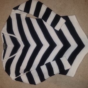 Size medium black and white striped sweater.